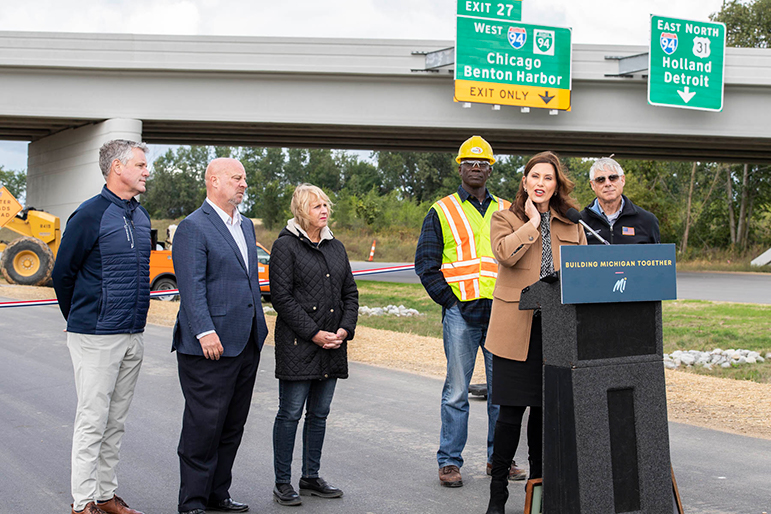 Political leaders at the late-September, 2022 US-31 freeway ribbon-cutting event, including Governor Gretchen Whitmer, U.S. Representative Fred Upton and others. Image courtesy of MDOT. 
