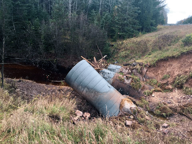 Remains of the twelve-foot culverts formerly channeling the East Branch of the Chocolay River in Marquette County.