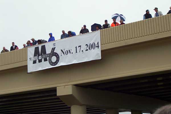 A view of the middle portion of the Byron Center Ave overpass from the westbound lanes of the South Beltline. 