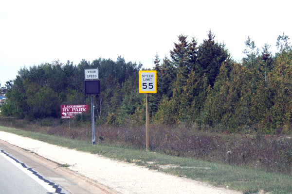 Speed Limit 55 and Your Speed indicator on US-2 WEST in St Ignace